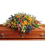 Colorful Reflections Casket Spray Sympathy Arrangement