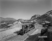 AT&SF EMD GP9 701 and Alco PA-1 76 at Sullivan’s Curve in the Cajon Pass – 1956