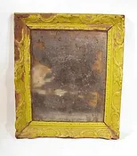 18th C. looking-glass in old green paint.