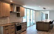 Eclipse Metropolitan Door Serotina Woodgrain Laminate and Trench Coat Matte Laminate Finish. Sonoma, California