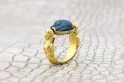 An Egyptian Revival Faience and Gold Ring