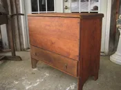 18th century pine blanket box with cut out base , hand forged square nail construction pulls and hinges are old but not original 18.5 wide 40 inches long 34.5 inches tall