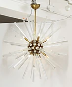 A Large Brass and Crystal Sputnik Chandelier —  elle w collection