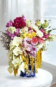 CALABASAS BLOSSOMS OF ELEGANCE