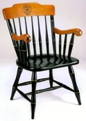 Captain's Chair, black with cherry finish arms & back and laser engraved Williams College seal.