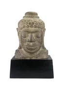 A Khmer Stone Head of a Buddha