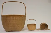 Lot 100E: Two Baskets and Doll’s Bonnet
