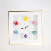 10x10 Clock with a Yellow Teapot and Purple Sugar Jar in a Gold Frame