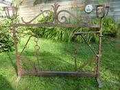 18th century  hand forged  ornate wrought iron  open hearth  cooking stand  with reservoirs for warming liquids  &amp; 2 crane arms  very rare one of a 
kind  50 inches wide  43 inches tall 11 inch feet