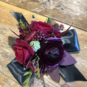 Burgundy and navy prom wrist corsage.