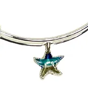 Bangle with starfish silver charm