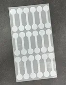 DTA7030 = White Tyvek Long Dumbbell Tags 1-7/8'' x 1/2'' (Pkg of 1000)