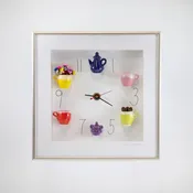 10x10 Clock with a Blue Teapot, Purple Sugar Jar, Flowers, and Coffee Beans in a Silver Frame