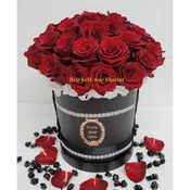 Red Roses in a Black Couture Box