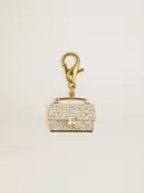 Charm aus goldfarbenem Messing in Handtaschenform mit Glassteinchen