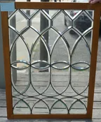 All beveled glass window in oak frame