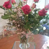 dozen roses in vase