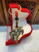 Keychain with copper coin and horse
