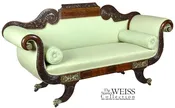 A Carved Classical Mahogany Settee with Mounts and Brass Inlay on Dolphin Feet, Philadelphia, c.1825