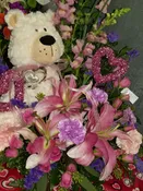 PLUSH BEAR AND FLOWERS
