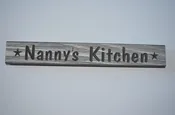 12″ Handcrafted Sign That Reads “Nanny’s Kitchen”