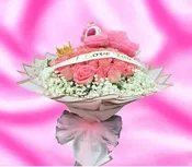 50 PINK ROSES WITH A SLEEPY TEDDY BEAR