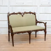 19th C. Carved Walnut Cattail Settee covered in Green Linen