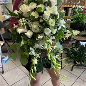 All white wedding bouquet with roses and orchids