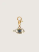 Charm aus goldfarbenem Messing in Augenform mit Glassteinchen