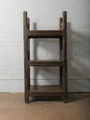 Carved Wooden Shelf with Architectural Lattice Detail