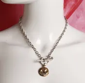 Face with crystals necklace