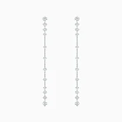 Arpeggia one line earrings in white gold