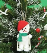 Sea Biscuit Skiing Snowman Christmas Ornament - 10 pcs @ $2.30 each; 30 pcs @ $2.05 each