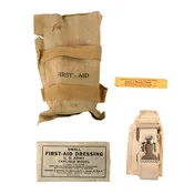 Original U.S. WWII Paratrooper Medical Bandage 2nd Pattern First Aid Packet Opened with Contents