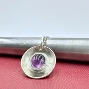 Inner Light: Amethyst Disc Pendant — Wings Jewelry & Gifts