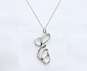 CALLIGRAPHIC 'E' INITIAL DIAMOND PENDANT — VIVAAN