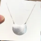 ATHENA BANDIT SMALL SILVER CRESCENT NECKLACE