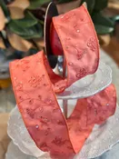 2.5" wide, dupion sequin embroidery floral, coral. SOLD BY THE YARD