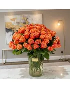 100 Premium Long Stem Orange Roses Arrangement