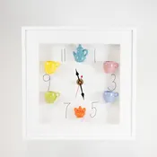 10x10 Clock with Teal Teapot and Orange Sugar Jar in a White Frame