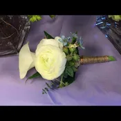 Boutonnierre - roses and ranunculus