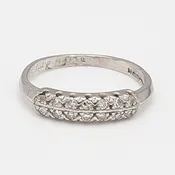 0.03 Carat Round Brilliant H SI1 Diamond Platinum Band Ring