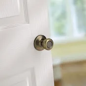 92001-512 Tylo Hall &amp; Closet Knob in Antique Brass