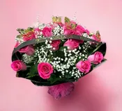2 DZ OF ROSES HOT PINK WRAPPED IN PAPER