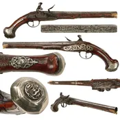 Original 18th Century Italian-Made Ottoman Silver-Mounted Flintlock Pistol with Carved Flamed Stock, Grotesque Mask Butt Cap, and Perforated Side Plate - Circa 1780