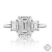# 109 Emerald cut  with Trapezoids 2ct