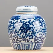 A Pair of Blue and White Bulb Jars with Lids