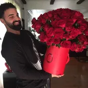 "Elegance in a Box: 120 Red Roses"