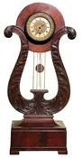 A Carved Mahogany Classical Shelf Clock with Lyre Form