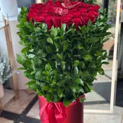 Long Red Roses in a Box.       The photo shows the deluxe size.